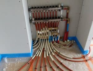 raccords suite à l'installation d'un plancher chauffant par l'entreprise Tama